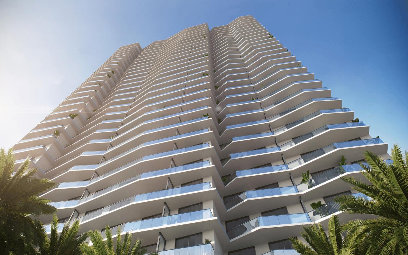 Torre Viceroy Brickell con balcones curvos y palmeras